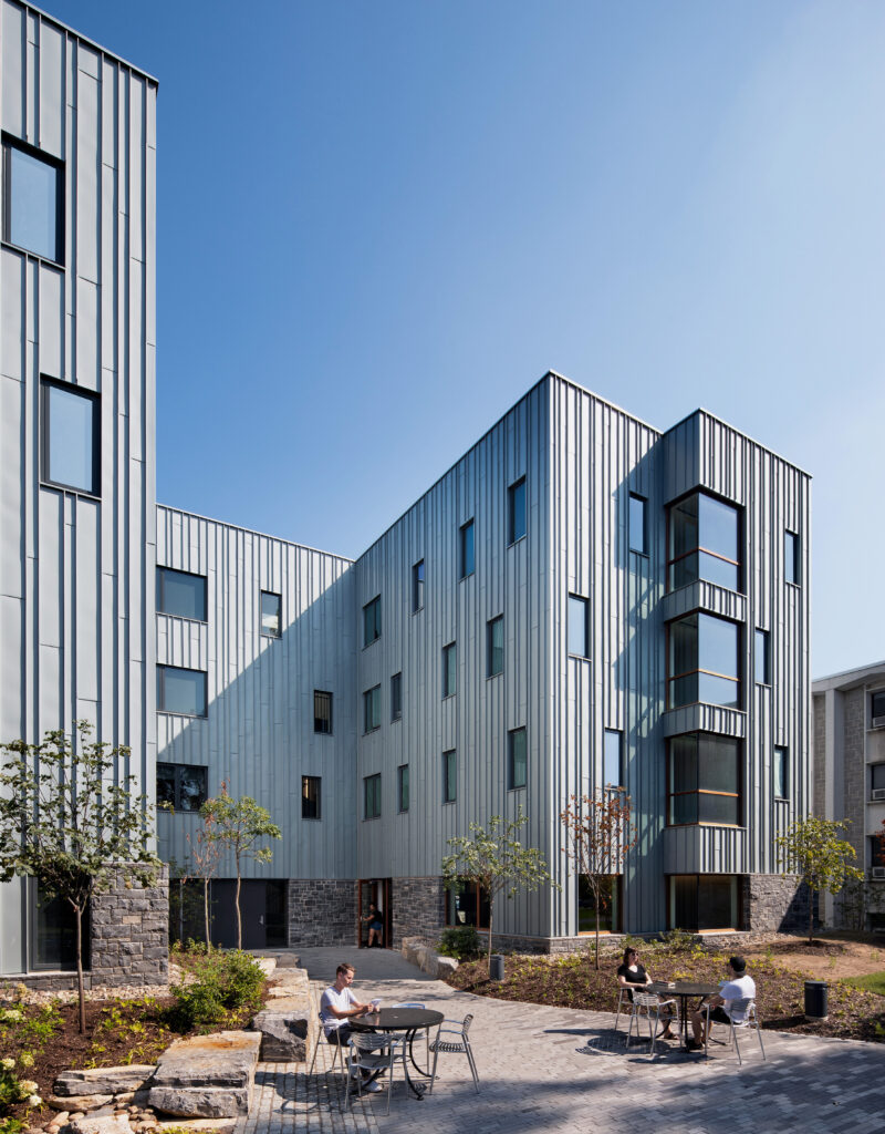 Exterior of a multi-story building with modern paneling