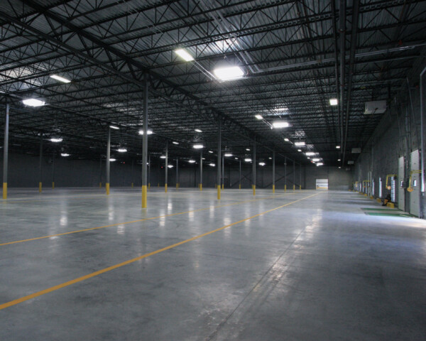 Interior of an empty well-lit warehouse