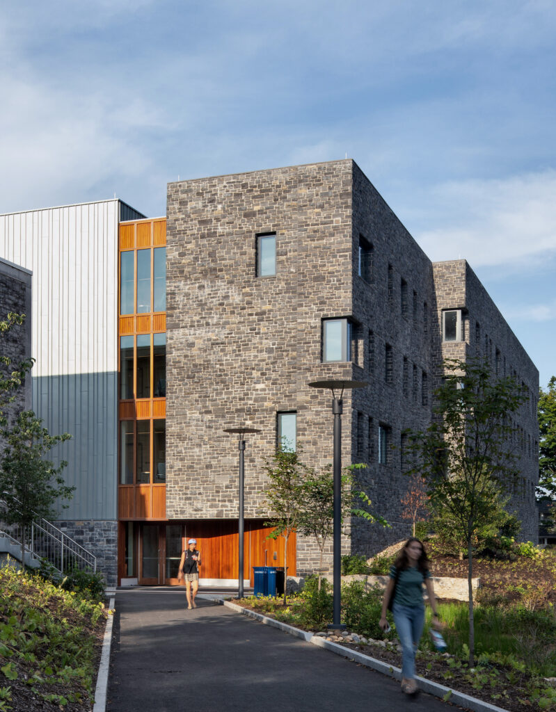 Exterior of a multi-story building with siding of different material